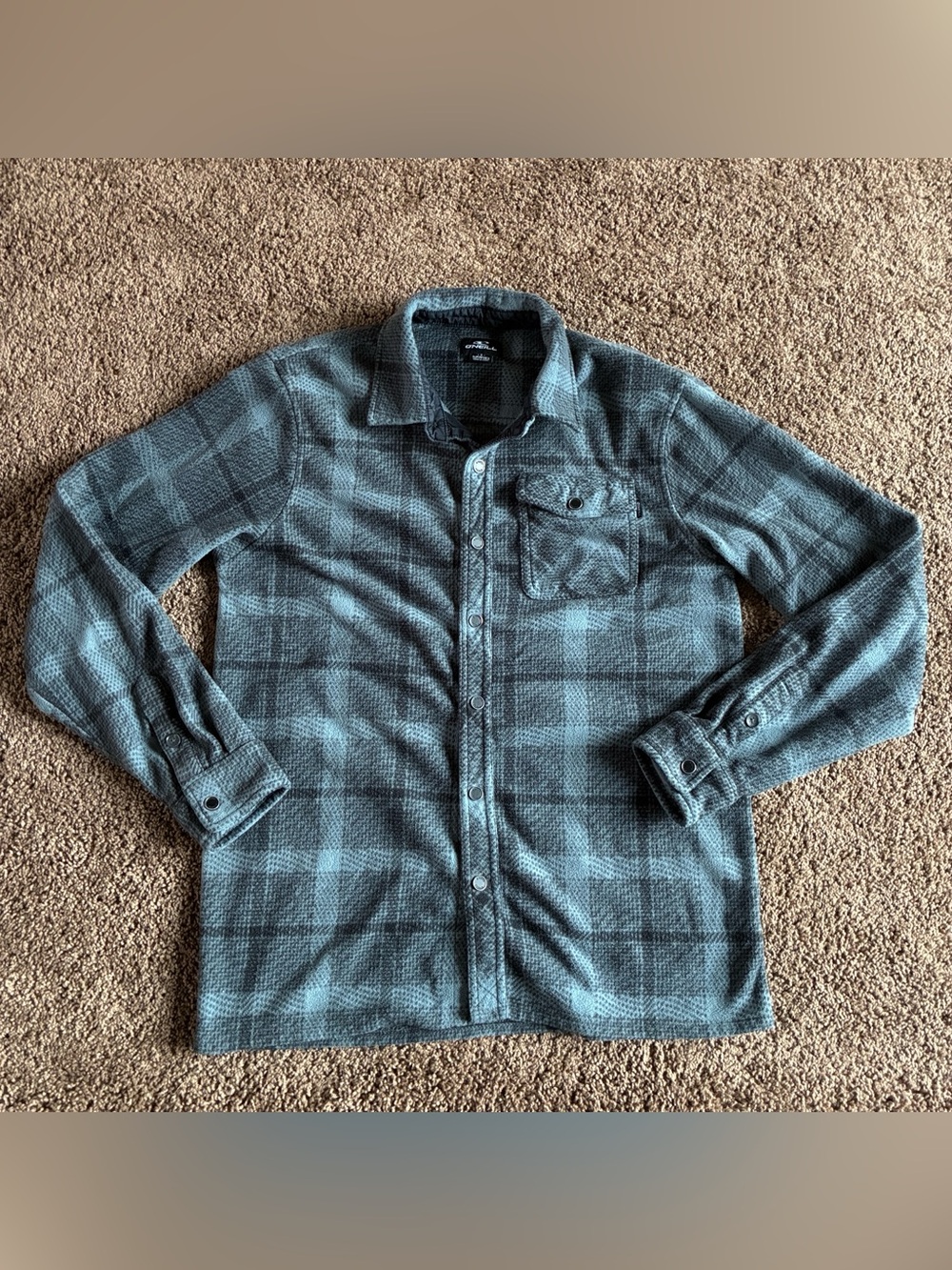 Gently used O’Neil Flannel snap “superfleece”